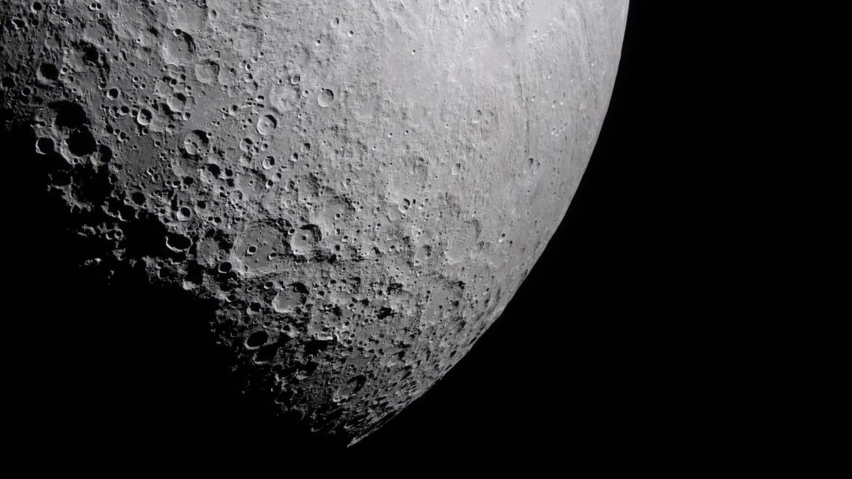 The cratered surface of the Moon near the terminator, where shadows reveal relief